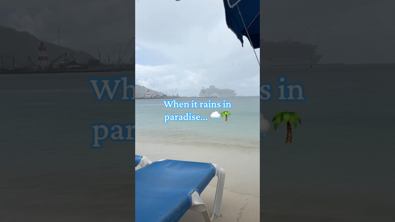 Rain on a Caribbean beach? We still go swimming! 🌧️🌊 #shorts #stmaarten #travelfail #cruiselife