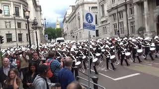 Massed Bands of HM Royal Marines marching back to Wellington Barracks after Beating Retreat 2024