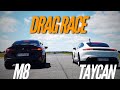 Drag race  porsche taycan vs bmw m8