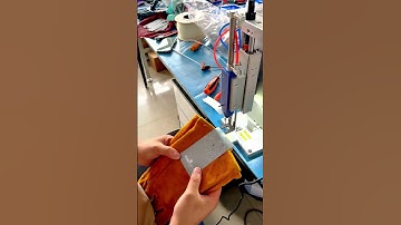 Tagging machine for gloves.