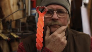 Forged fire poker with Heart Finial