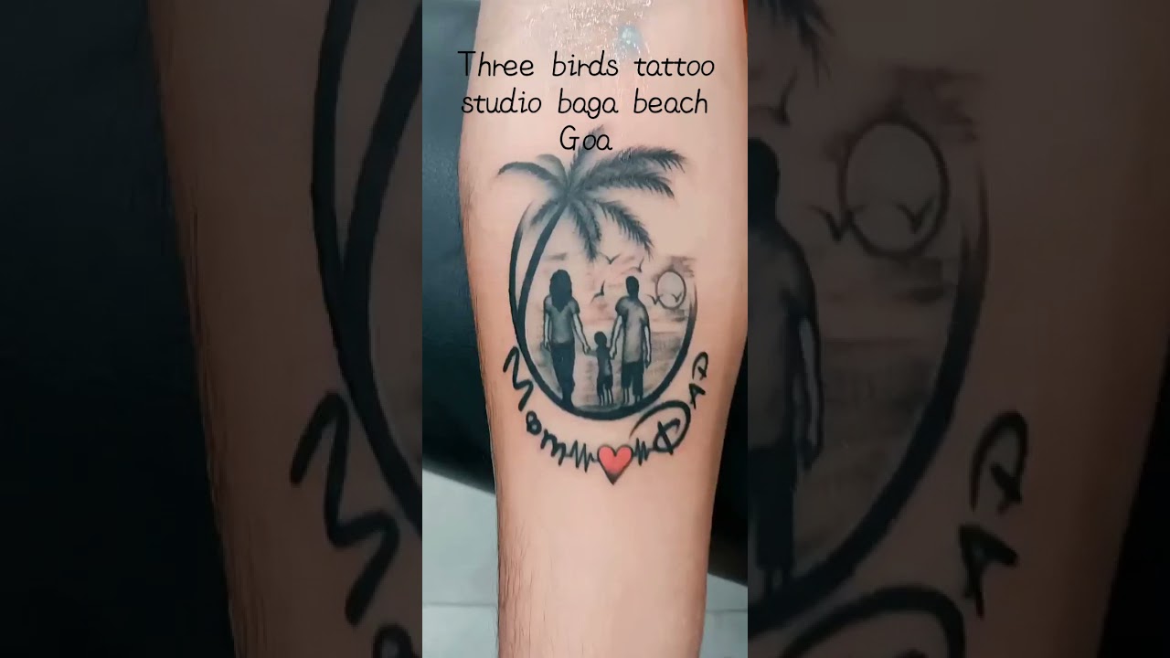 Tattoo of three birds on Yolanda's wrist.
