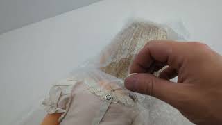 Pull cord without cassette on a Charmin' chatty doll