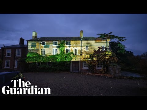 Greenpeace activists project film about fuel poverty on to rishi sunak’s mansion