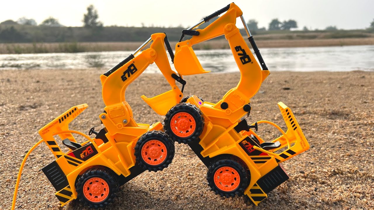 jcb-3dx-vs-jcb-3dx-fighting-in-river-jcb-fighting-jcb-accident