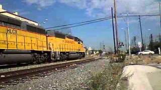 The Saugus Local passes San Fernando Rd with a Awesome Engineer & Roll by. 7-25-11.
