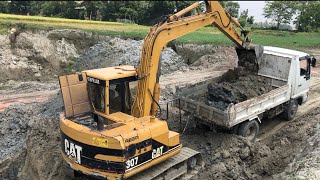 Caterpillar E70B Excavator Loading Dump Trucks | WEE VLOGS