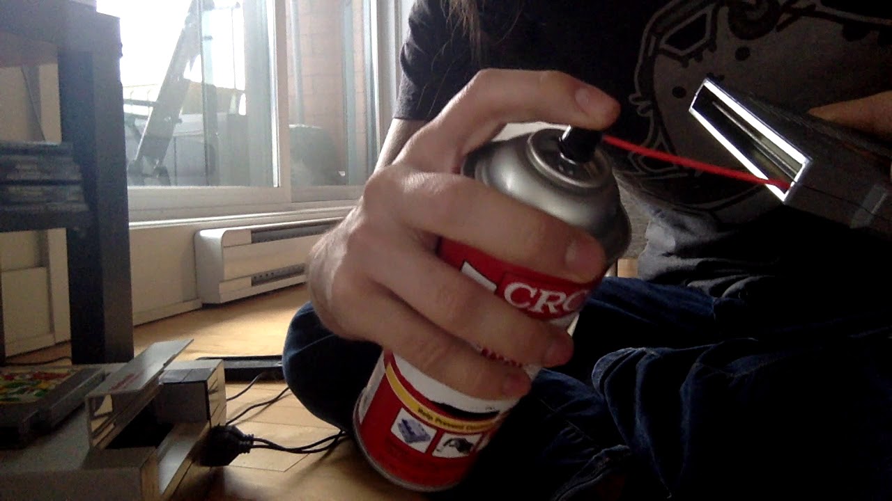 Cleaning Game Cartridges Consoles with Contact Cleaner Cleaning Game Cartridges Consoles with Contact Cleaner