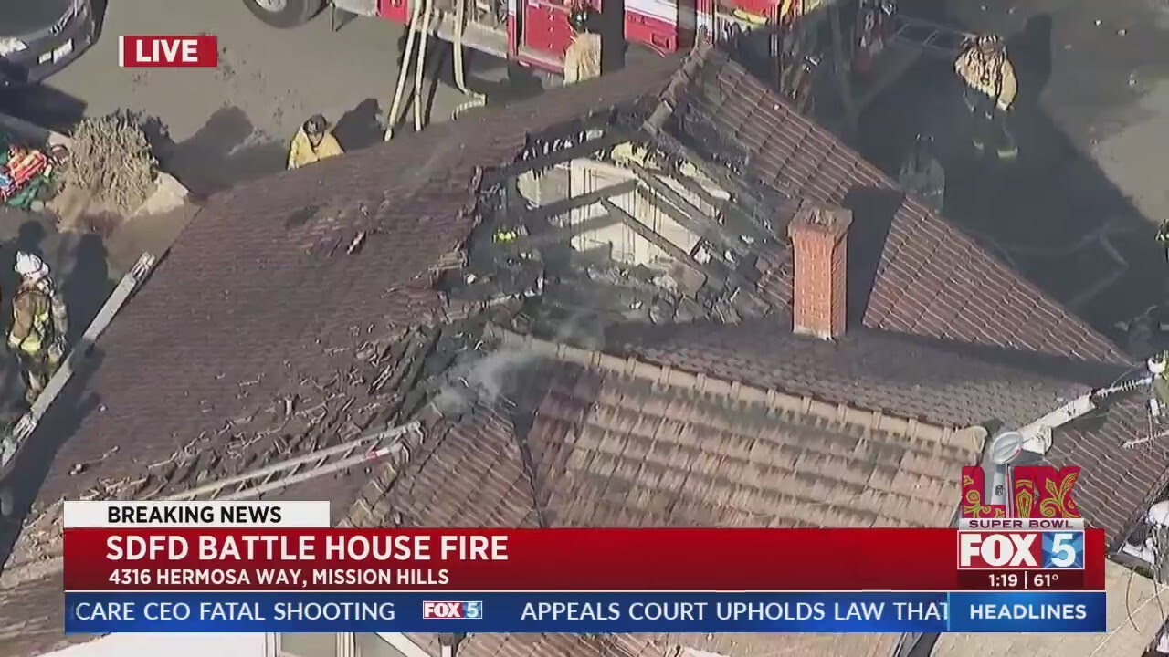 Fire crews battle house fire in Mission Hills - YouTube