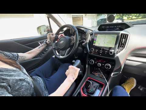 Tara Demonstrates Driving With The Veigel Classic Ii In Adaptive Mobility's Subaru.