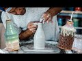 How to throw an Oil Bottle or Skinny Necked Pieces on the Pottery Wheel!