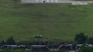 See tracks near a plane that caught fire in Brookshire