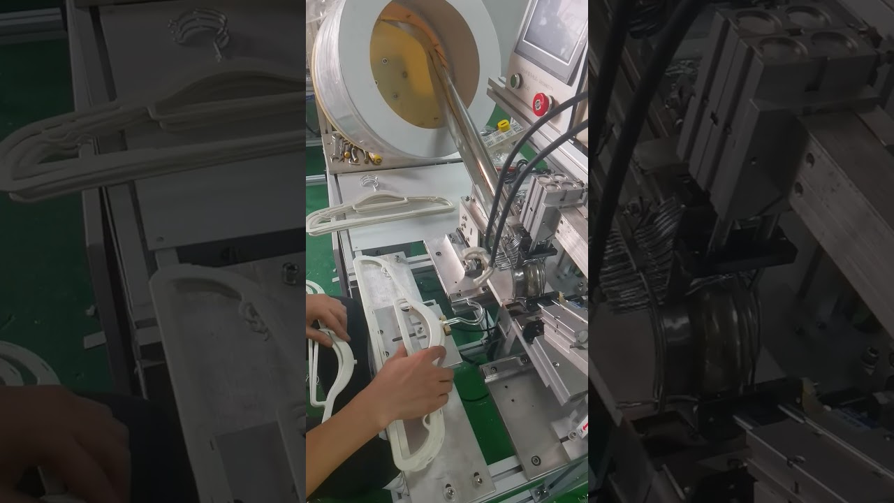 Plastic hanger hook assembling machine