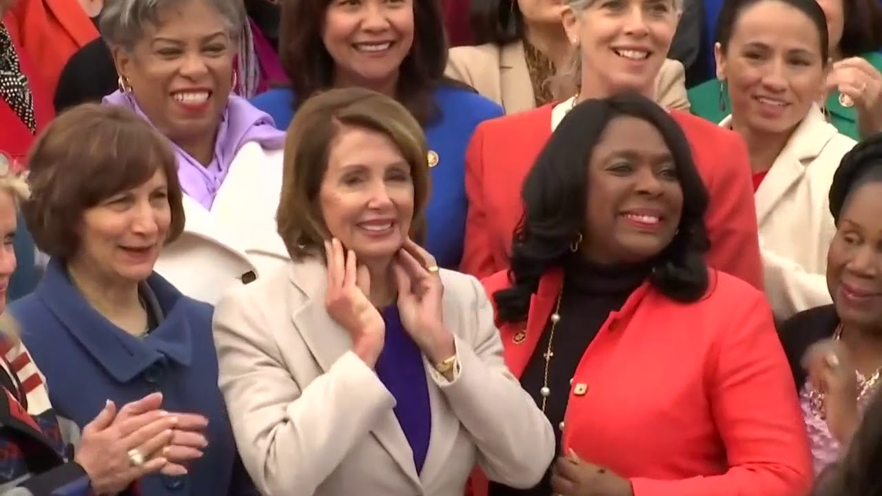 Female House Democrats pose for class photo newspaper mockup