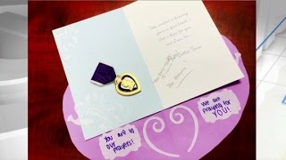 Anonymous military veteran gifts purple heart.