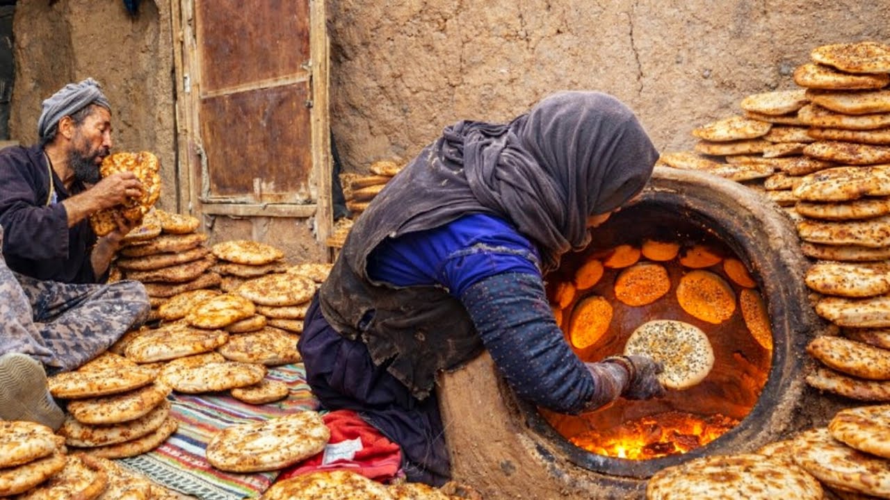 Life in the village; Loving couple baking bread in the tandoor | Rural life in Afghanistan |