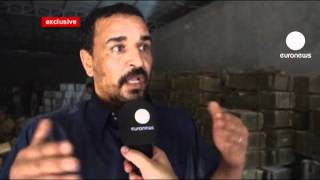 Rebels find Gaddafi arms dump in civilian area