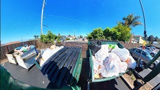 Waste Management Autocar/Heil Freedom half pack garbage truck dumping bins