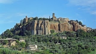 Orvieto is one of the quintessential hill-towns central italy. it
perches on a rock crag above all landscape. not only does occupy an
amazing loc...