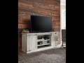 Carynhurst 70&quot; TV Stand by Ashley W755 - SpeedyFurniture.com