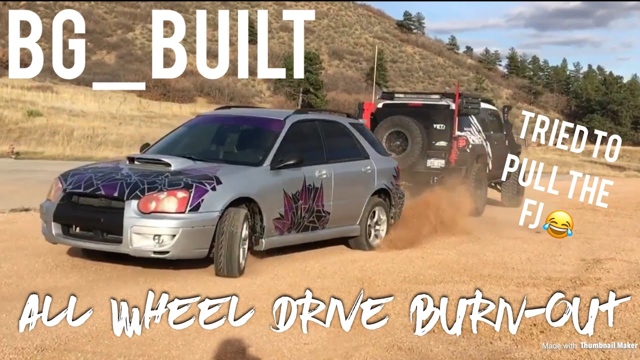 SUBARU WRX pulling Toyota FJ