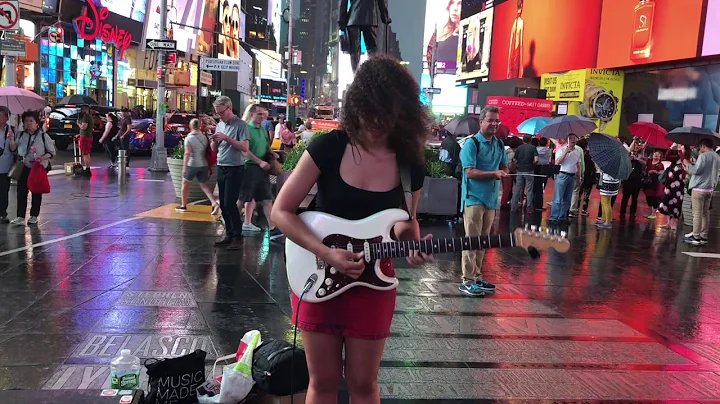 Jackie Venson Playing the Blues in Rainy Times Squ...