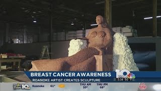 Artist promotes breast cancer awareness with underwater mermaid statue