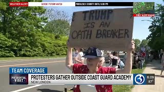 Protestors of President Trump gather outside of Coast Guard Academy