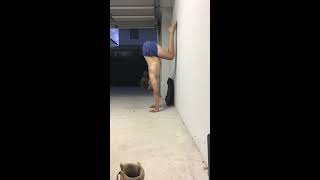 Tuck handstand chest to wall