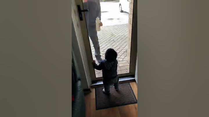 Baby excited to see dad coming home from work