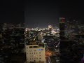Rooftop nights in Da Nang—sparkling city lights, the beach below, and Beach Road glowing