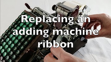 Replacing an adding machine ribbon