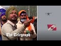 Indian farmers use kites to down tear gas dropping drones