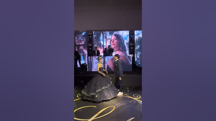 Liz Macedo e Michel dançando a valsa na festa de 15 anos