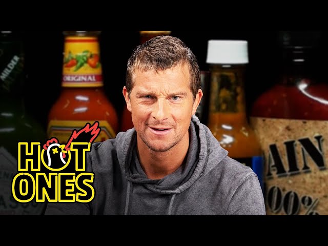 Bear Grylls Battles For Survival Against Spicy Wings | Hot Ones class=