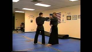 Aiki Combat Jujits Orange Belt Outside Scissor Block