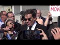 Former US Rep George Santos talks to reporters after guilty plea in fraud case