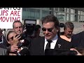 Former US Rep George Santos talks to reporters after guilty plea in fraud case