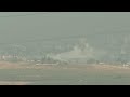 Smoke seen rising on the skyline of the Gaza Strip as fighting continues