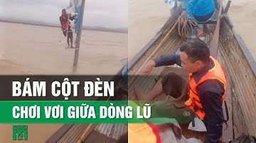 Người đàn ông bị lật đò trong lũ, bám vào cột đèn suốt 12 tiếng| VTC14
