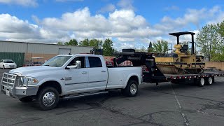 Ram 3500 hauling a Roller from the auction.  (DIFFICULT TO LOAD THIS MOFO)