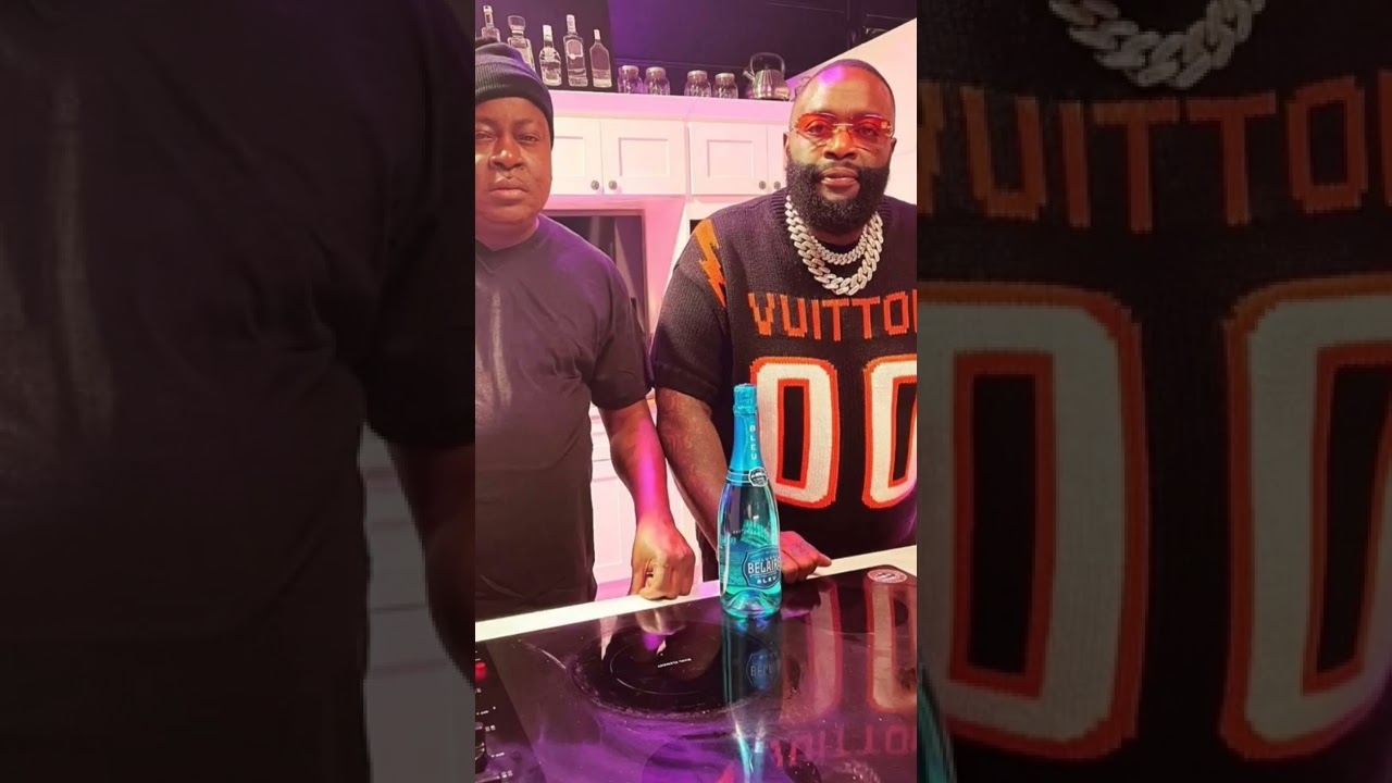 RICK ROSS IN LOUIS VUITTON CHUNKY INTARSIA FOOTBALL T-SHIRT 