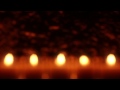Defocused Votive Candles - HD Stock Footage Background Loop
