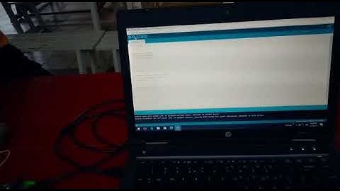 A program in Arduino IDE to control DC motor direction based on potentiometer (POT) analog input