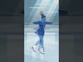 How do ice skaters control their spin speed?