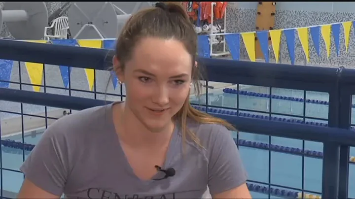 Dual threat: Julia Peterson on varsity swim, baske...