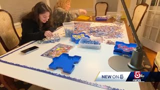 Giant puzzle brings neighbors together during COVID-19 pandemic