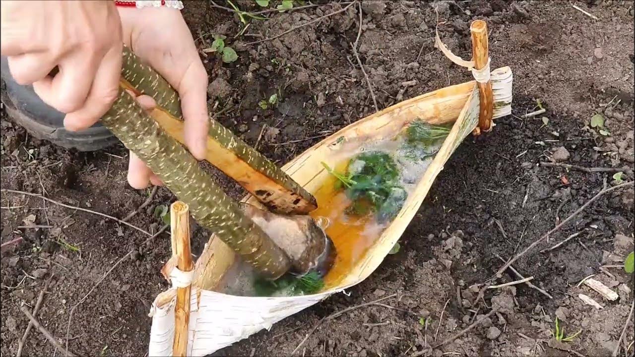 Boiling nettles in birch bark container with hot rocks YouTube