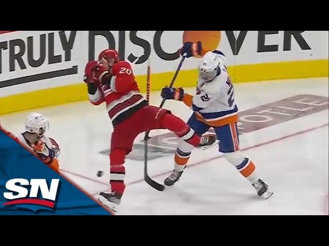 Canes' Aho, Oilers' Hyman each take a puck off the face