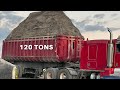 Trucks are unloading 5500 tons of sand  gravel onto a barge s6e1